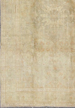 Faded Vintage Turkish Konya Rug with Medallion, Florals and Taupe Background