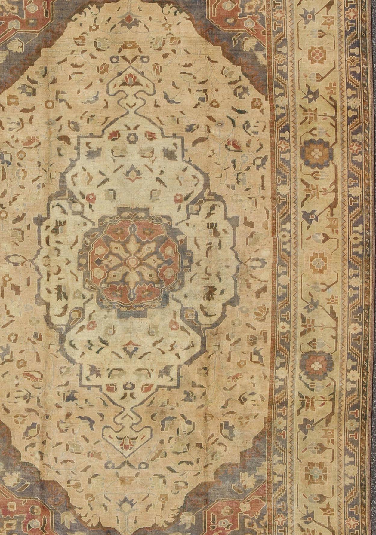Turkish Oushak Rug Vintage with Layered Medallion in Ivory, Red, Blue and Olive In Excellent Condition For Sale In Atlanta, GA