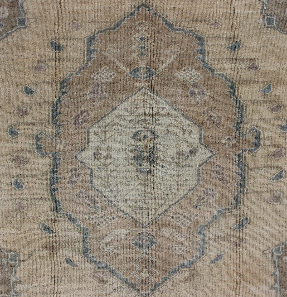 Wool Vintage Turkish Oushak Rug with Tribal Medallion in Ivory, Camel, and Gray For Sale