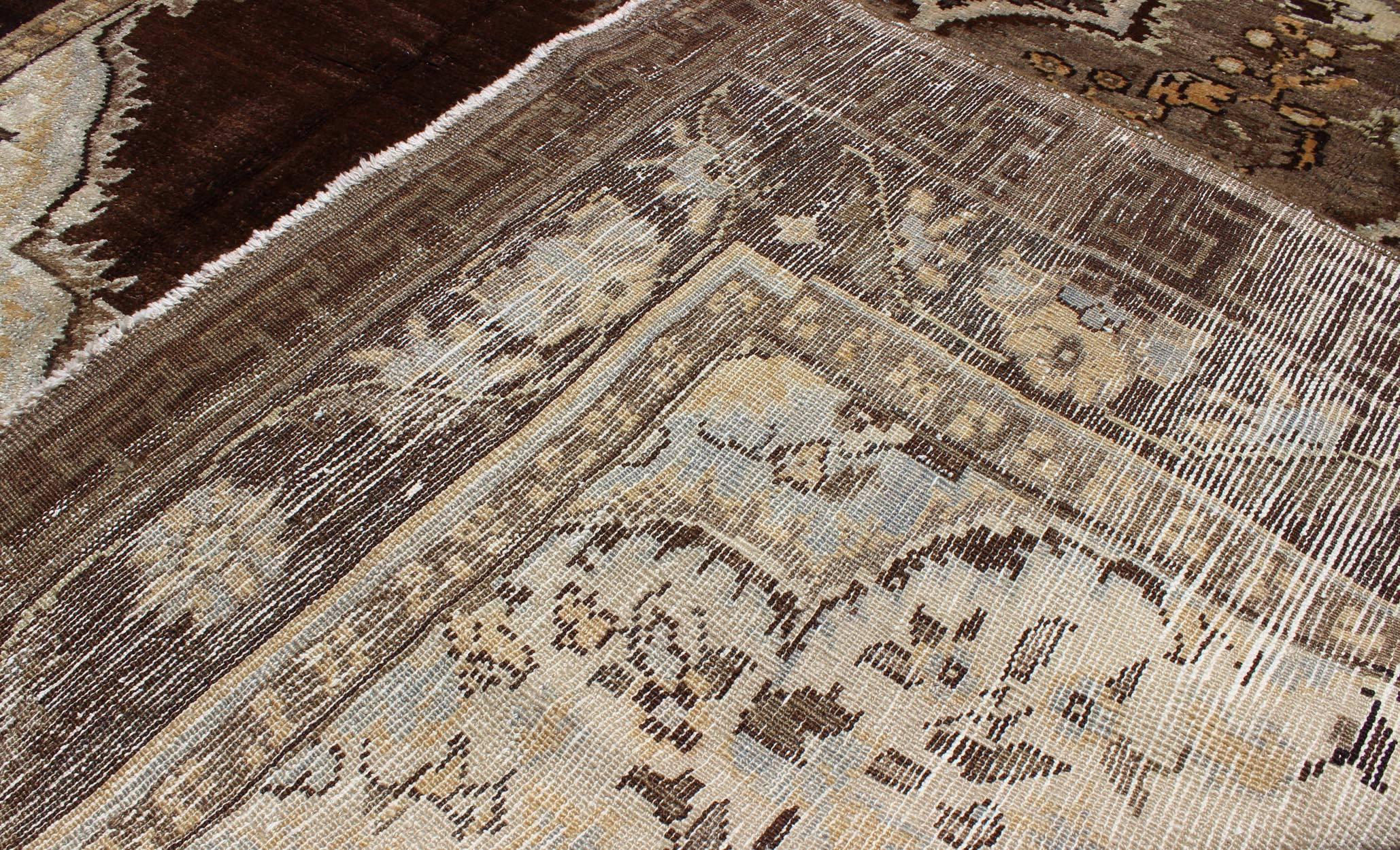 Wool Brown Background Floral Medallion Vintage Turkish Kars Rug in Ivory and Taupe For Sale