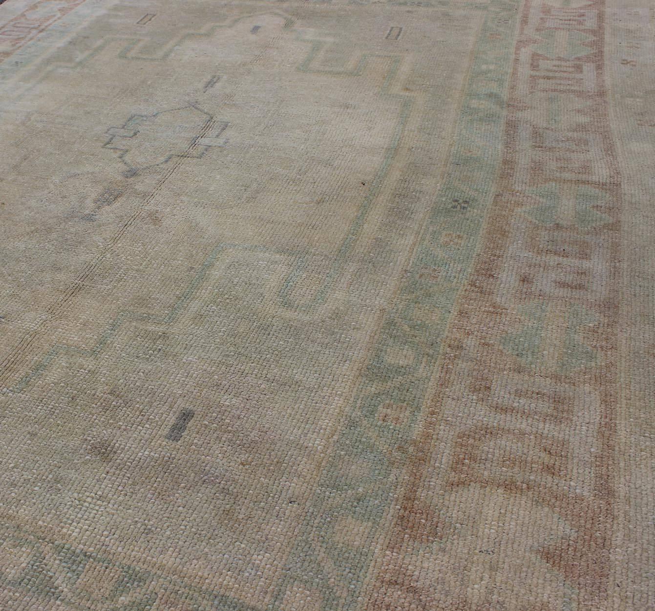20th Century Pale Color Turkish Oushak Rug with Geometric Motifs in Light Brown, Tan & Green For Sale