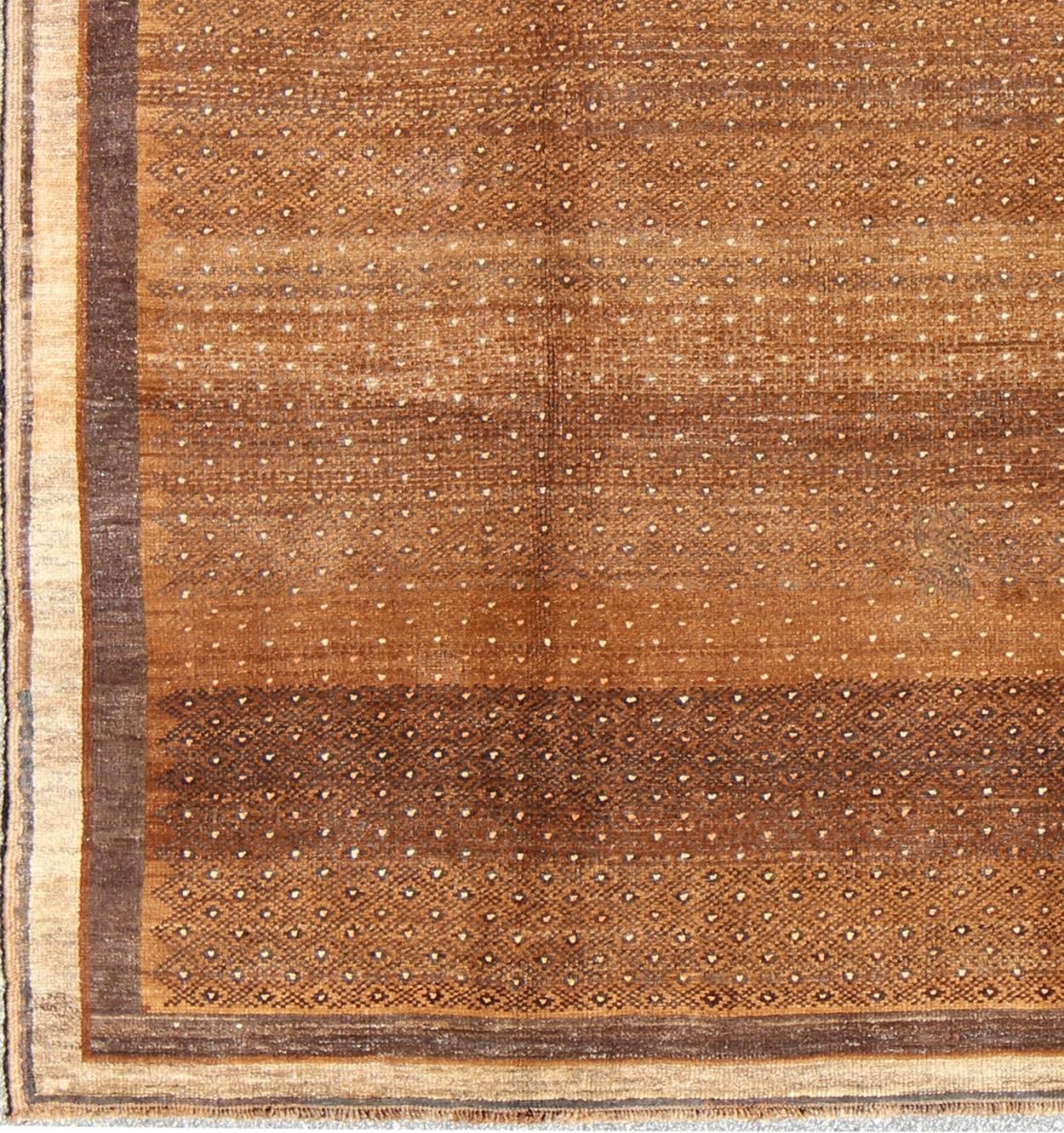       Vintage Turkish Rug With All-Over Modern Design in Shades of Brown, Keivan Woven Arts / rug EN-484, country of origin / type: Turkey / Oushak, circa mid-20th century.

Set on a brown field with an all-over modern/Mid-Century Modern pattern,
