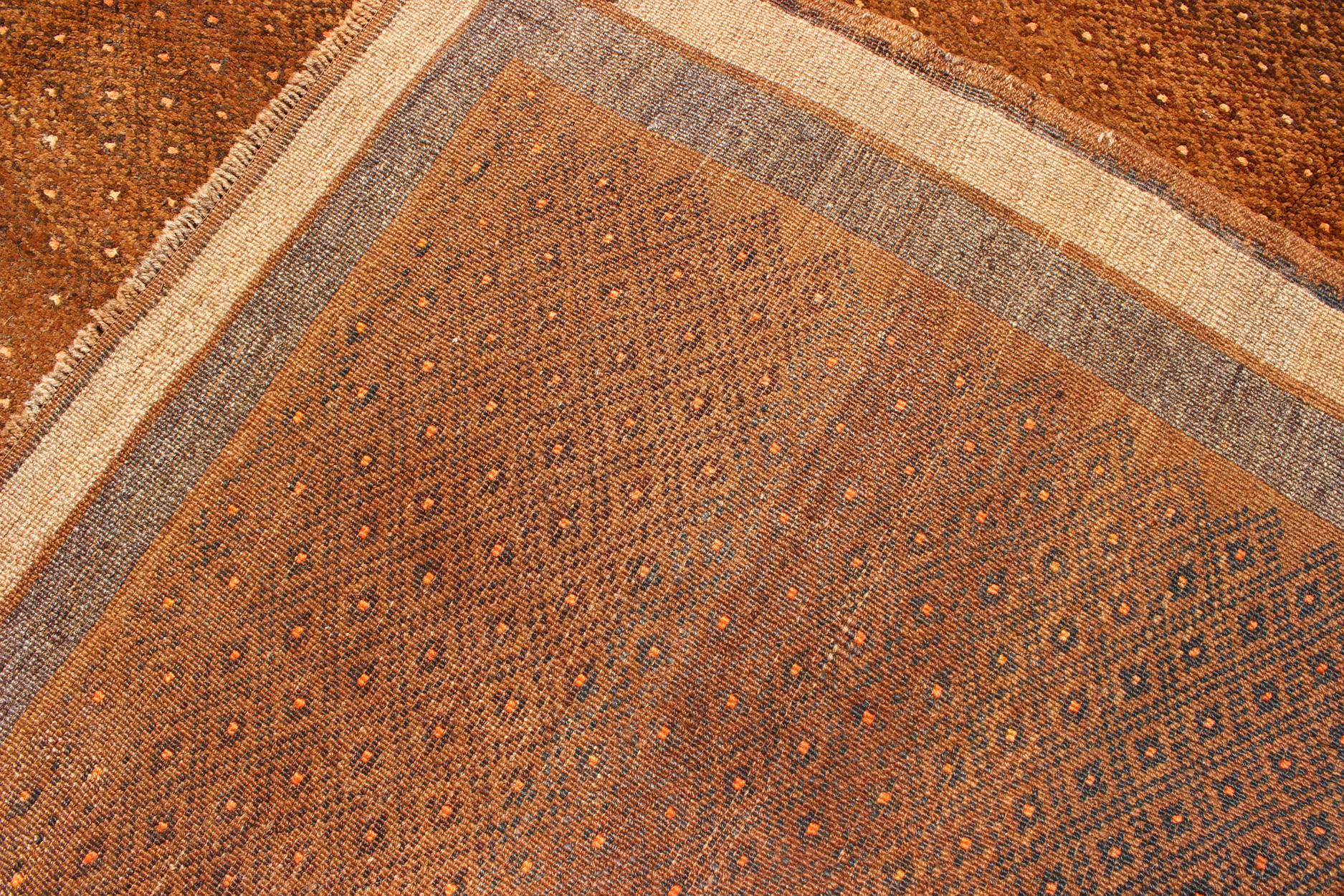 Wool Vintage Turkish Rug With All-Over Modern Design in Shades of Brown For Sale