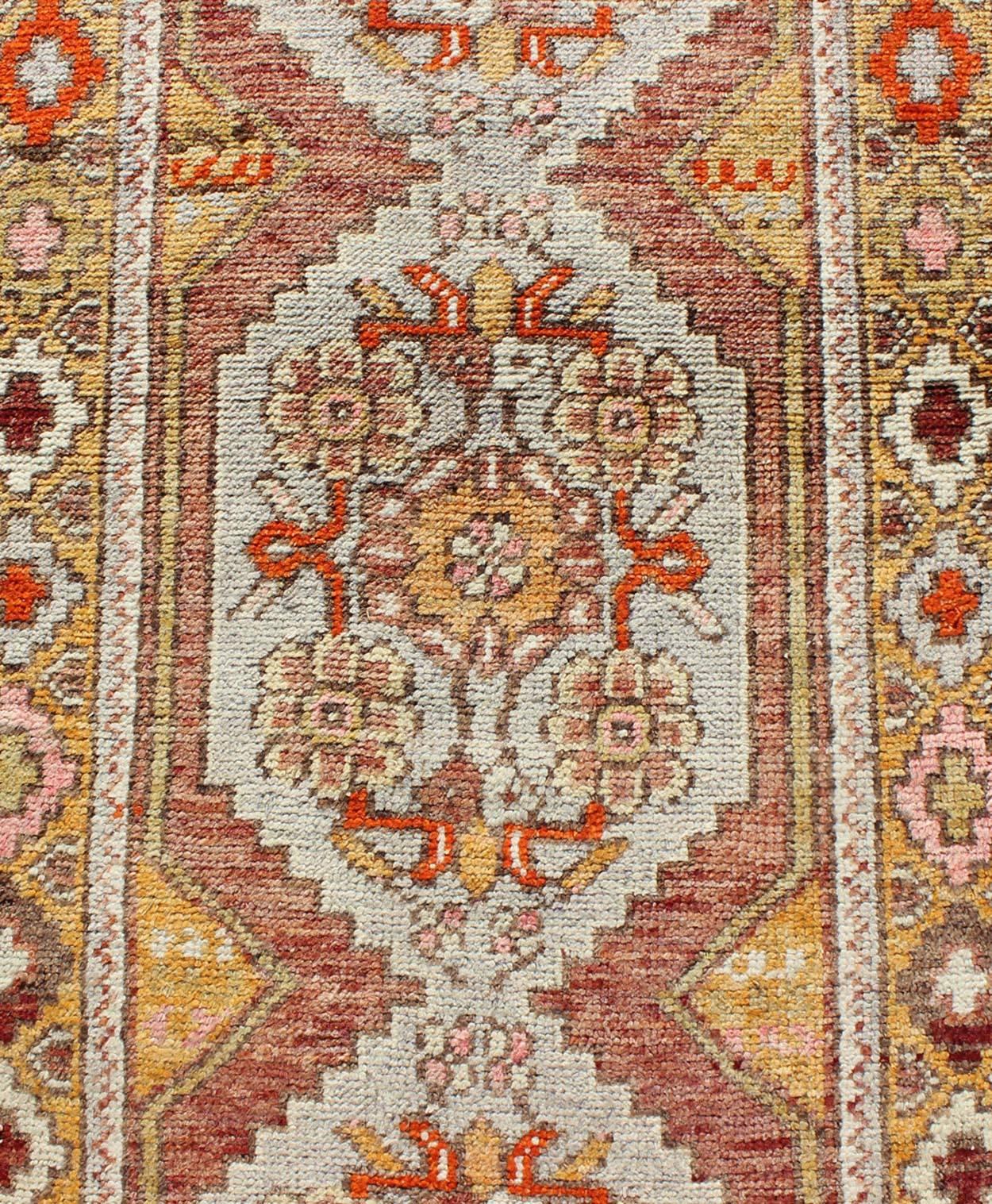Early 20th Century Colorful Antique Oushak Runner with Four Medallions in Yellow, Red, Green, Gray For Sale