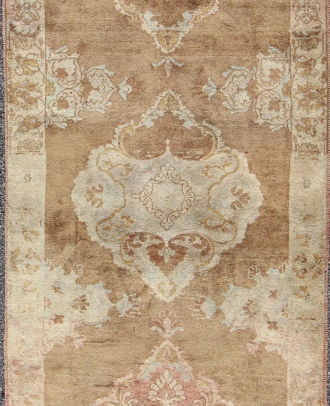 Vintage Turkish Oushak Runner with Floral Medallions in Light Brown and Ivory In Excellent Condition For Sale In Atlanta, GA