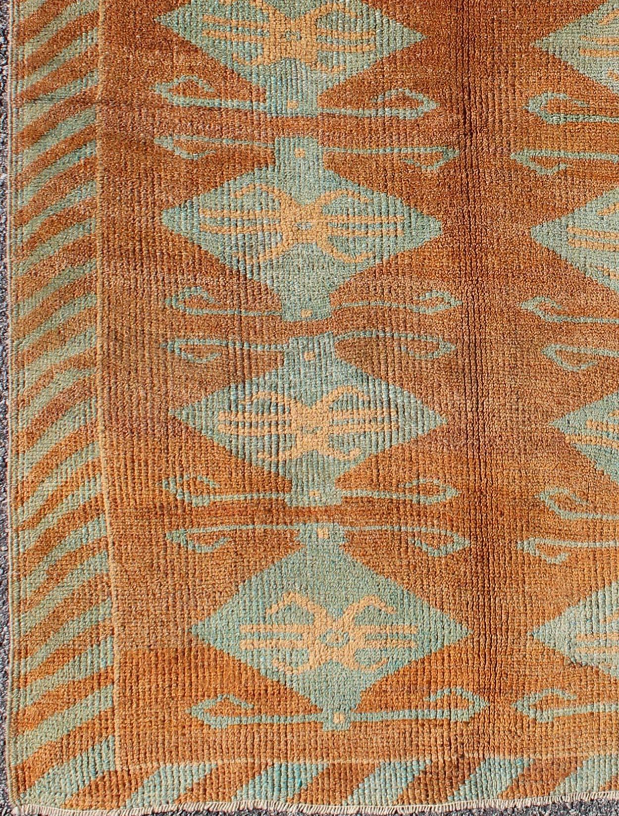  Antique Turkish Tulu Rug with Tribal Medallions in Copper and Light Blue green.   Antique Tulu rug, Keivan Woven Arts/ rug TU-9102, country of origin / type: Turkey / Tulu, circa 1930's

Measures: 4.7 x 6.2.   

This antique Turkish Tulu-Oushak rug