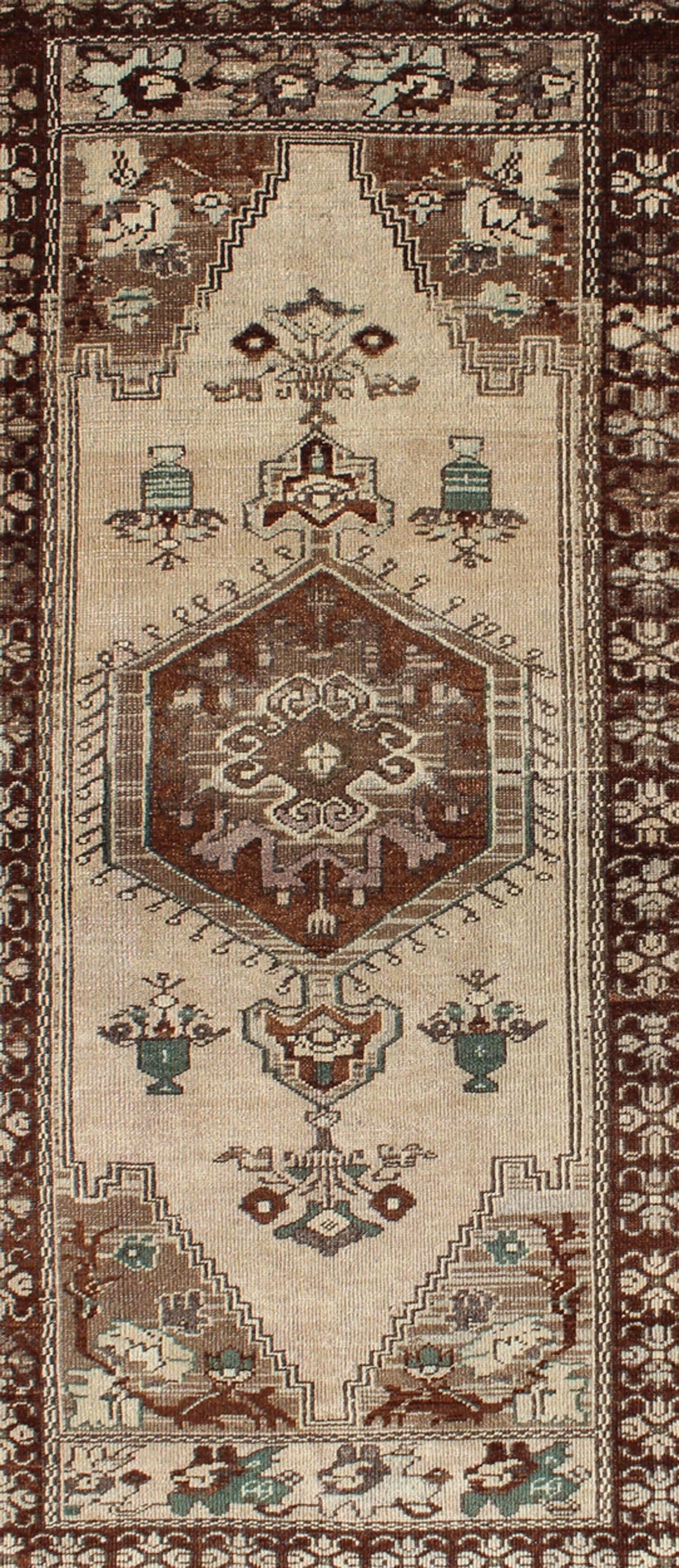 Hand-Knotted Turkish Oushak Vintage Rug with Central Medallion and Floral Motifs in Brown For Sale