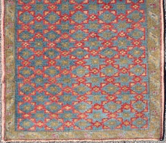 Turkish Konya Rug with All-Over Floral Lattice Design in Red, Blue, Olive Green