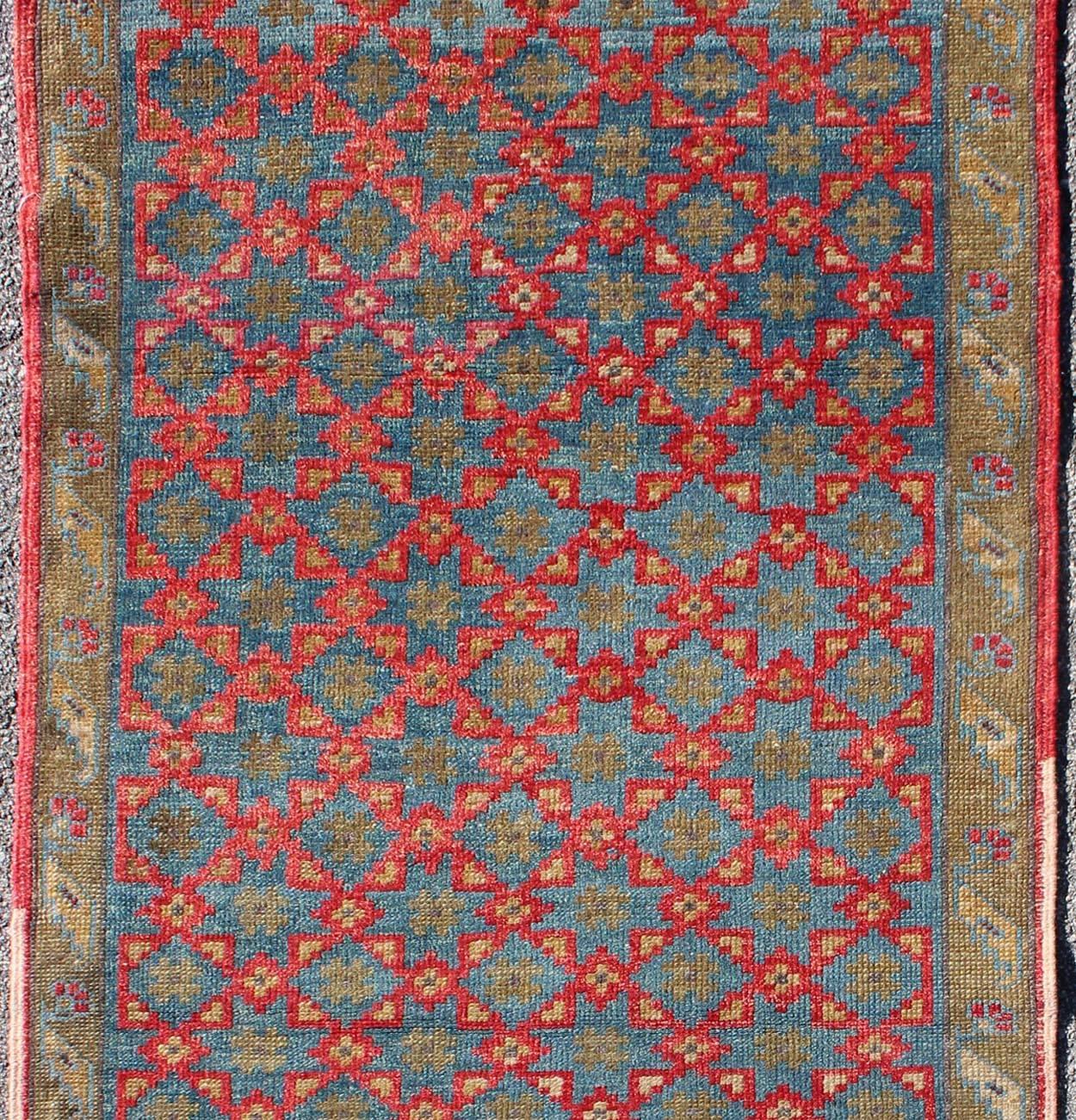 Modern Turkish Konya Rug with All-Over Floral Lattice Design in Red, Blue, Olive Green For Sale