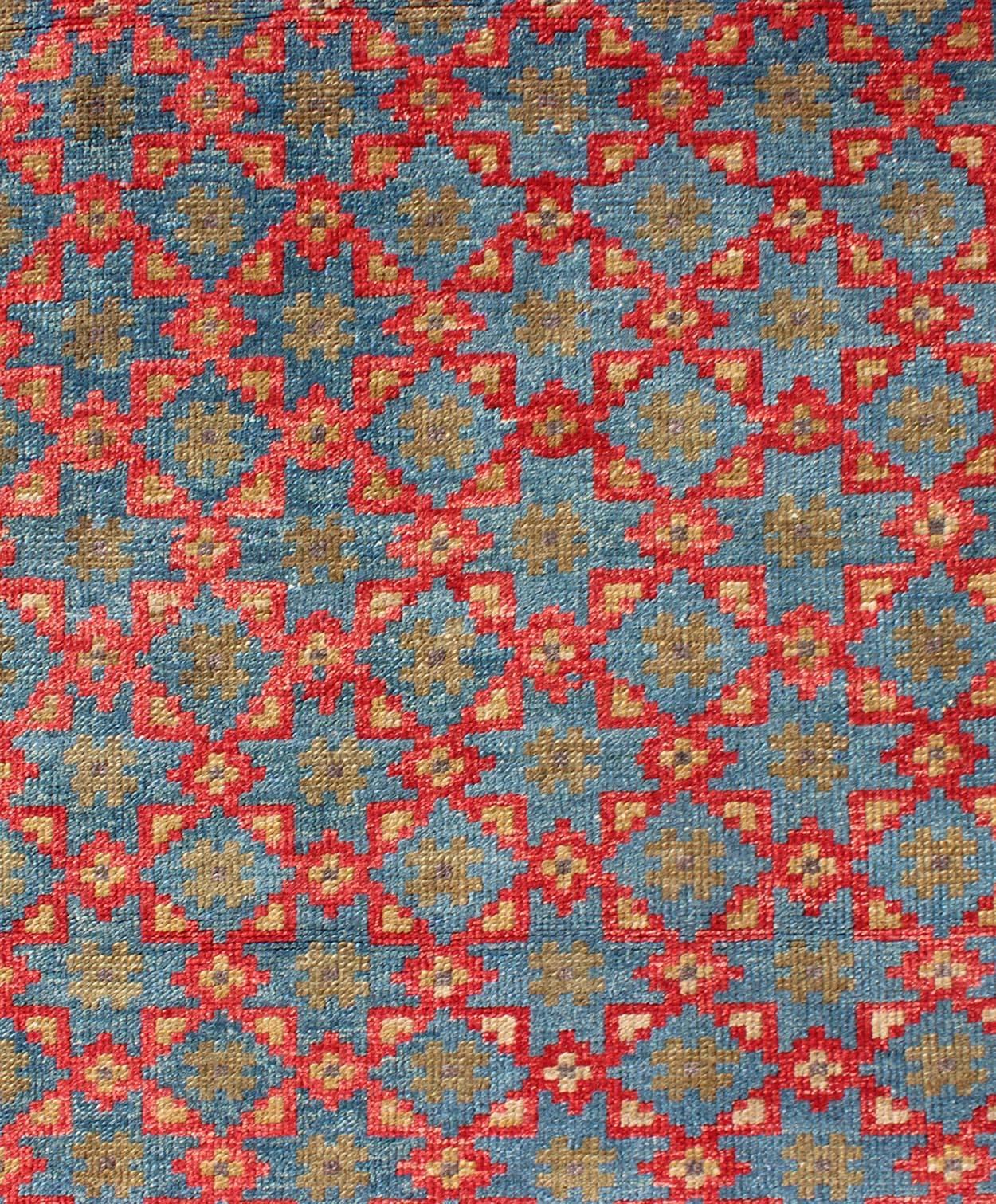20th Century Turkish Konya Rug with All-Over Floral Lattice Design in Red, Blue, Olive Green For Sale