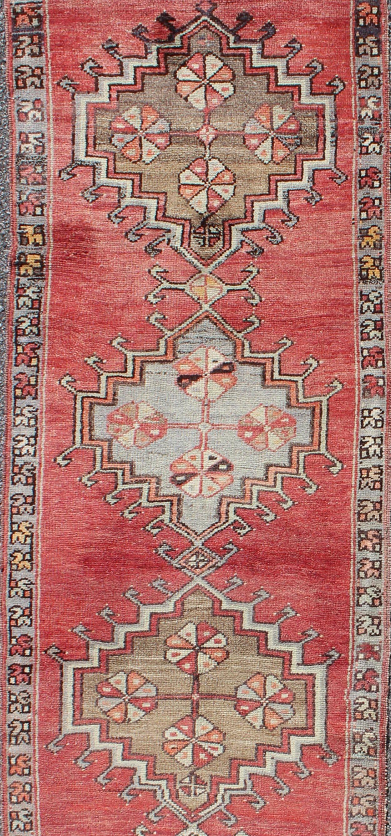 Tribal Geometric Vintage Turkish Oushak Runner with Medallions on Red Background In Excellent Condition In Atlanta, GA