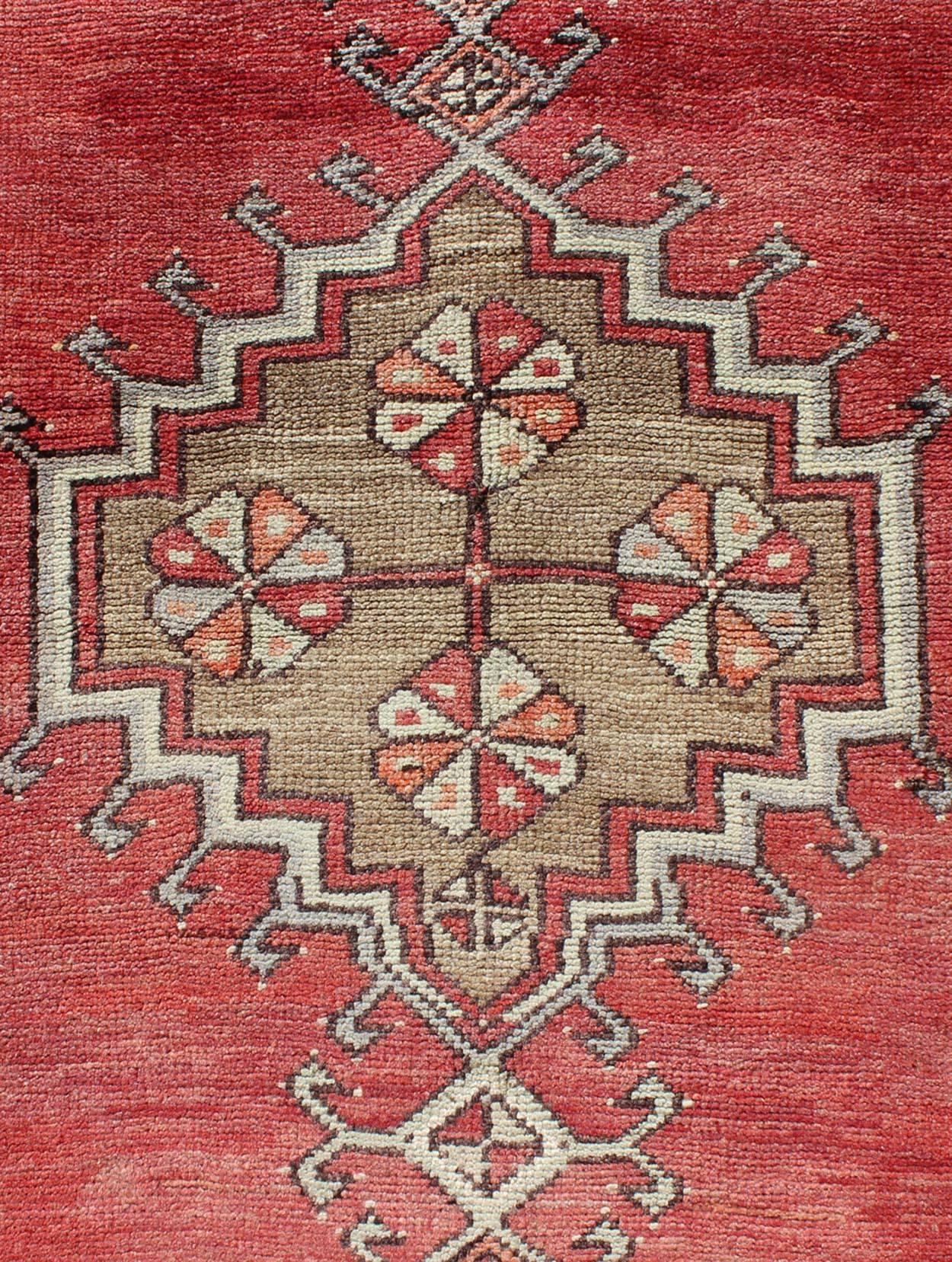 Wool Tribal Geometric Vintage Turkish Oushak Runner with Medallions on Red Background