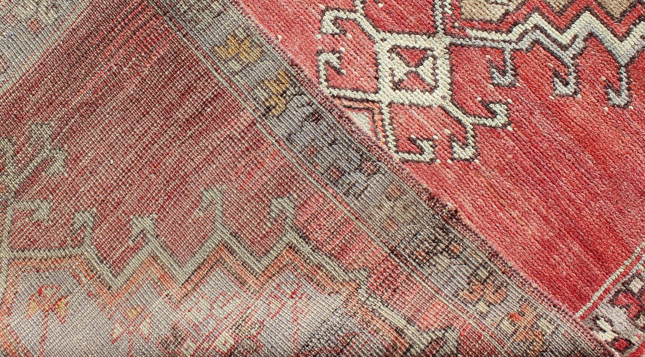 Tribal Geometric Vintage Turkish Oushak Runner with Medallions on Red Background 1