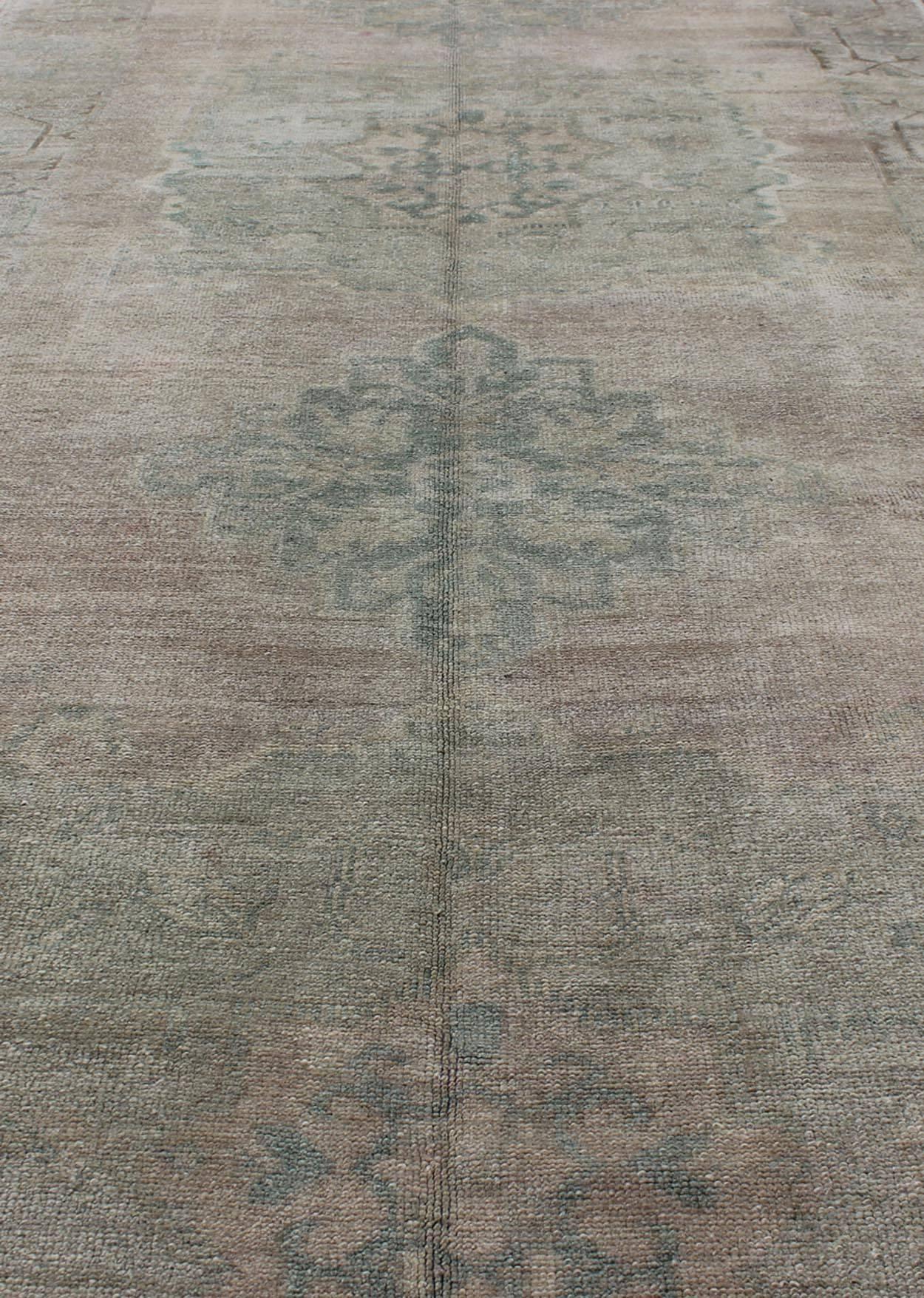 Wool Faded Vintage Turkish Oushak Runner with Dual-Medallion in Lavender and Green For Sale