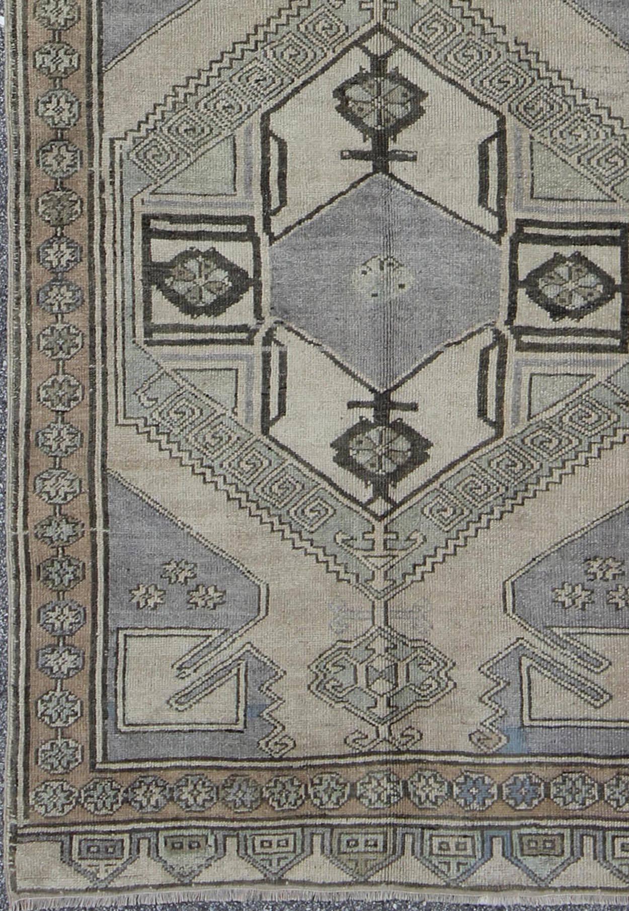 Mid-Century Turkish Oushak Vintage Runner with Dual Medallions in Lavender, Gray, rug fah-95194, country of origin / type: Turkey/Oushak, circa mid-20th century

This Mid-Century Turkish runner features a dual central medallion design as well as