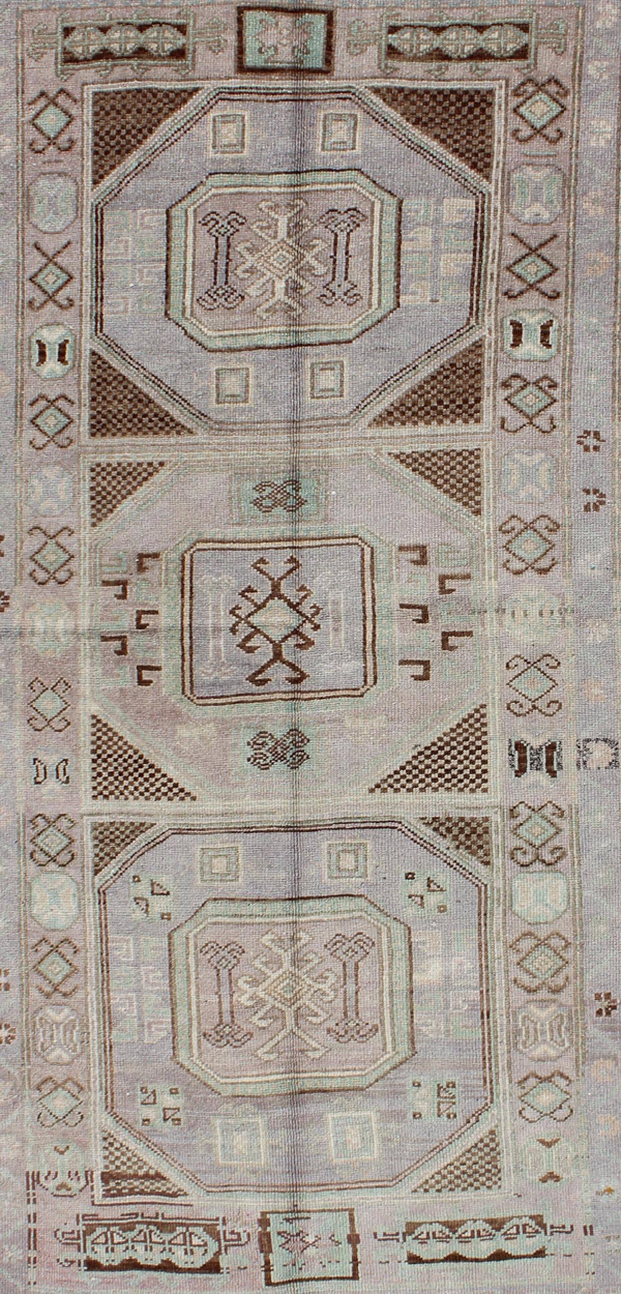 Hand-Knotted Vintage Turkish Oushak Rug with Tribal Geometric Medallions in Light Lavender For Sale