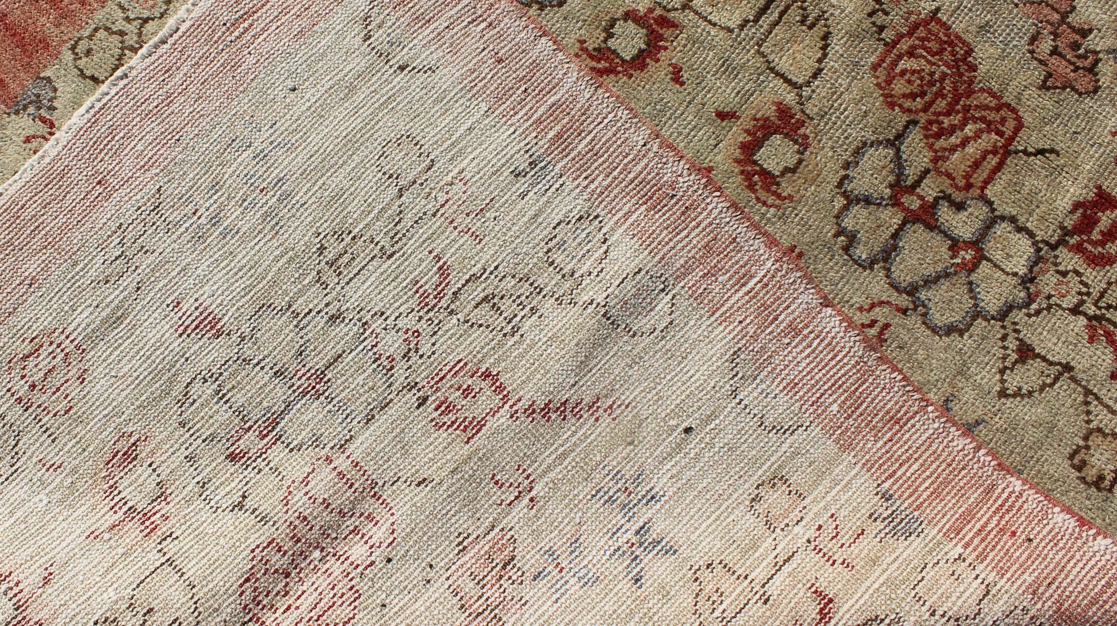Wool Turkish Oushak Vintage Rug with All-Over Floral Design in Cream and Salmon Pink For Sale