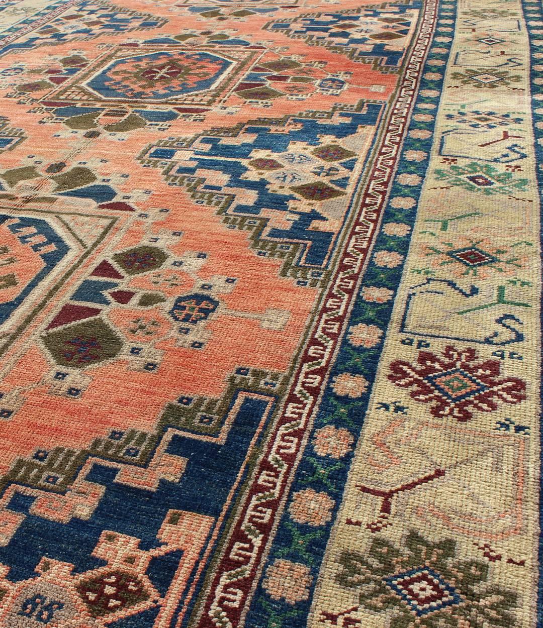 Vintage Oushak Rug from Turkey with Medallions in Salmon Pink and Blue In Good Condition For Sale In Atlanta, GA