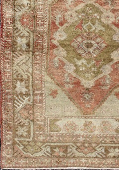Vintage Turkish Oushak Rug with Soft Sage, Coral, and Faded Ivory Tones
