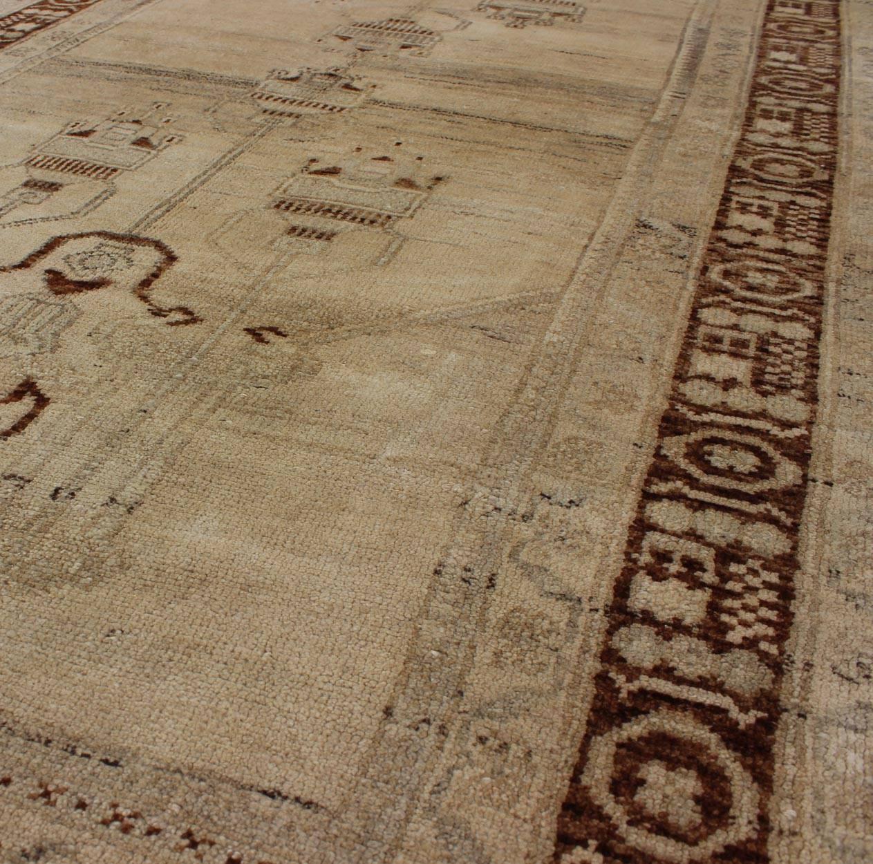 20th Century Taupe Background Turkish Vintage Oushak Rug with Tribal Design in Brown & Cream For Sale