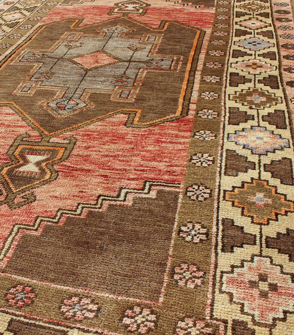 20th Century Vintage Turkish Oushak Rug with Tribal Design in Rose, Brown and Yellow For Sale