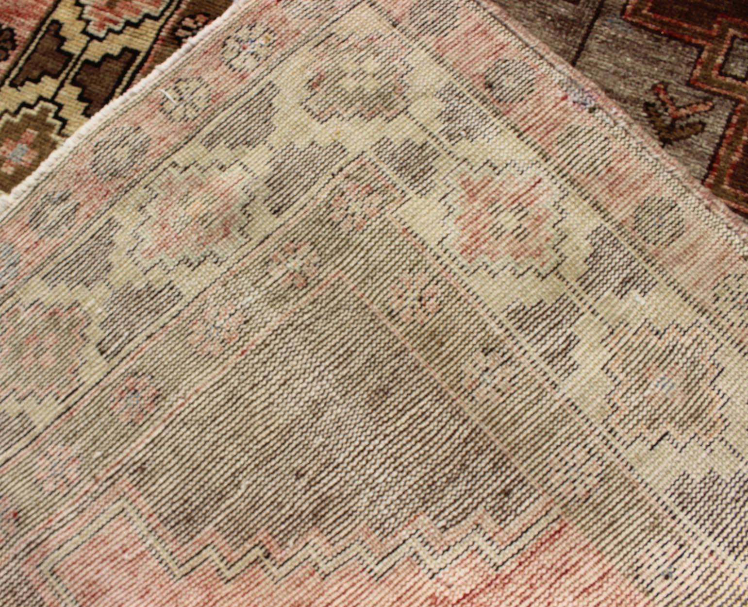 Wool Vintage Turkish Oushak Rug with Tribal Design in Rose, Brown and Yellow For Sale