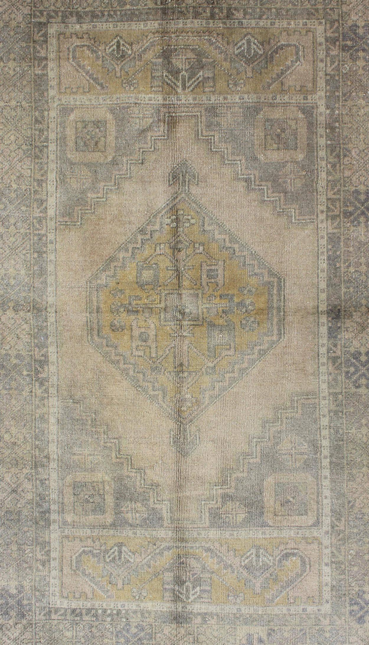 Hand-Knotted Muted Mid-Century Turkish Oushak Rug with Tribal Geometric Medallion Design
