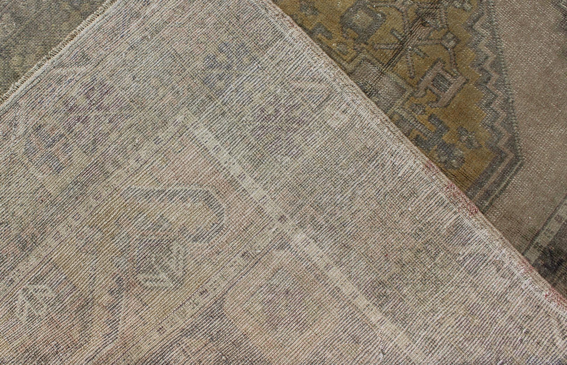 Wool Muted Mid-Century Turkish Oushak Rug with Tribal Geometric Medallion Design