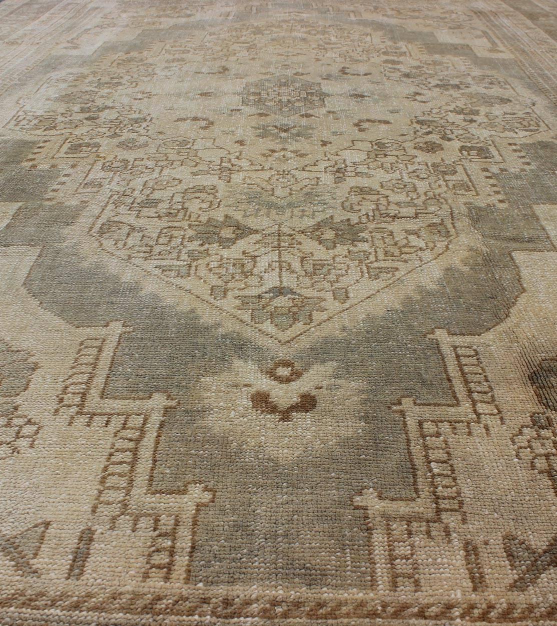 Wool Vintage Turkish Oushak Rug with Floral Medallion Design in Ivory and Gray For Sale