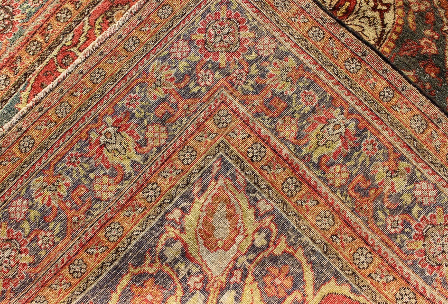 Early 20th Century Antique Turkish Sivas Rug with Multi-Layered Medallion in Red, Teal & Orange For Sale