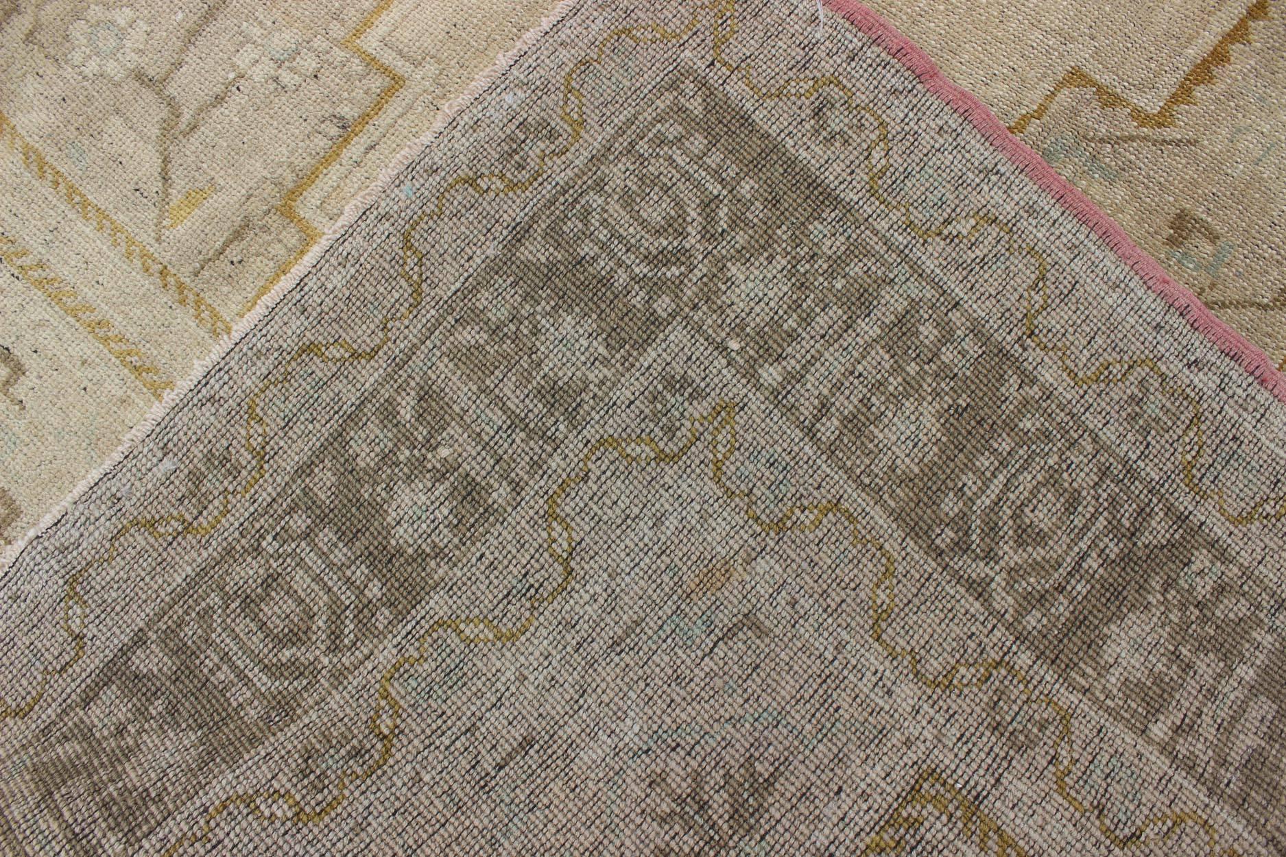 Wool Mid-Century Vintage Oushak Rug from Turkey with Floral Geometric Medallion For Sale