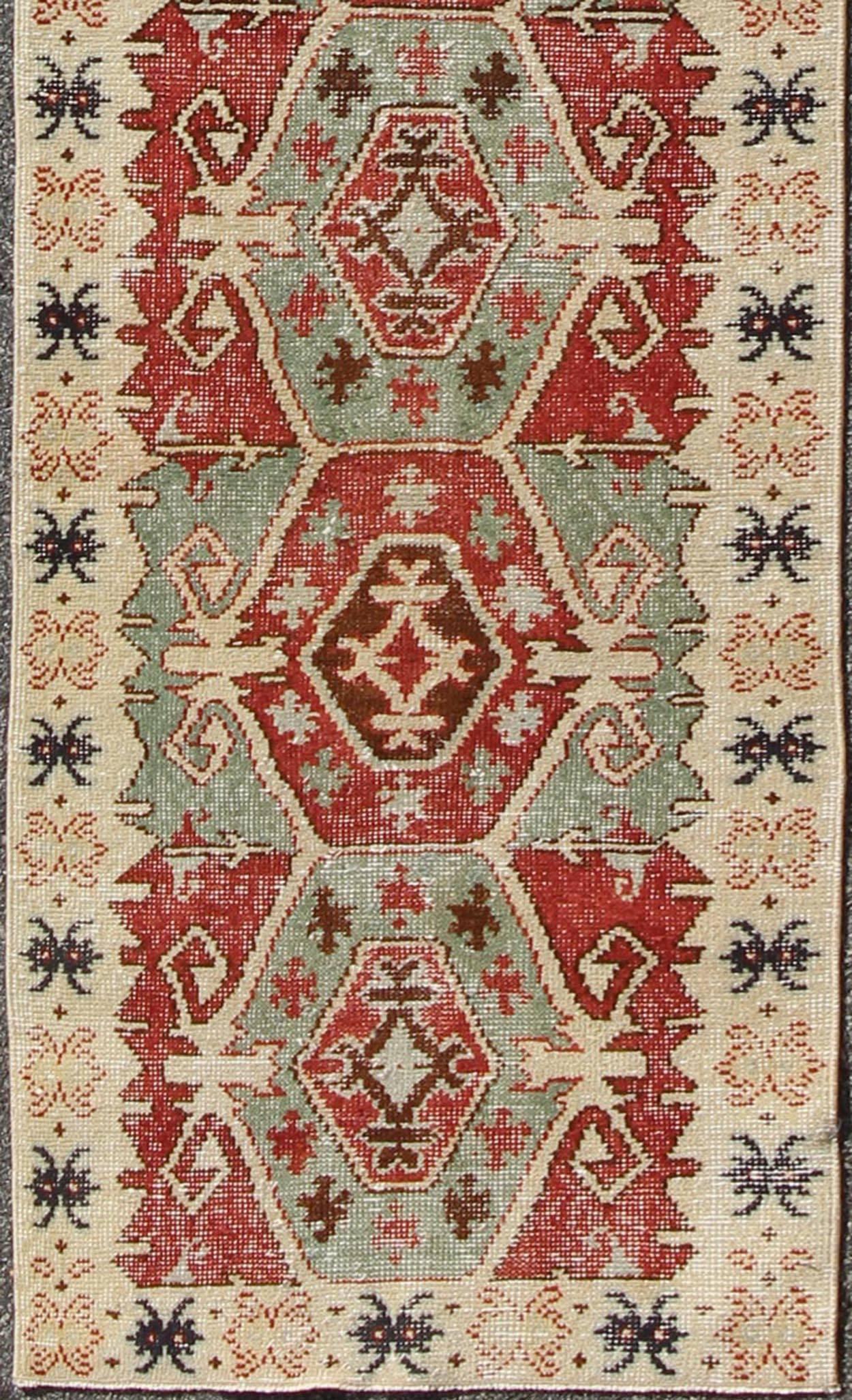 Vintage Turkish Oushak Runner rug with Geometric Tribal Medallions. Keivan Woven Arts, Rug/TU-MTU-3359, 1950's Vintage Turkish Oushak Runner in Teal and Red, rug mtu-3359, country of origin / type: Turkey / Oushak, circa mid-20th