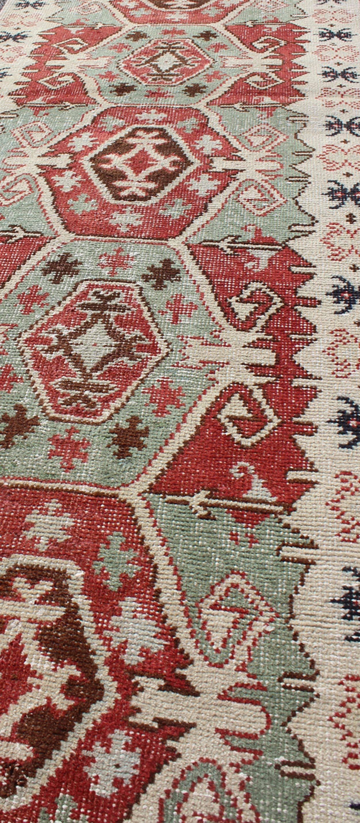 20th Century Geometric Medallions Vintage Tribal Turkish Oushak Runner in Green, Brown & Red For Sale