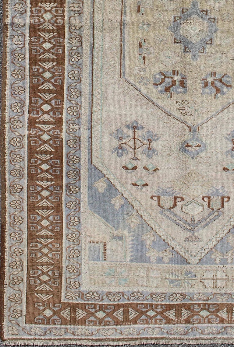 Vintage Turkish Oushak Rug with Tribal Motifs and Medallion For Sale at ...