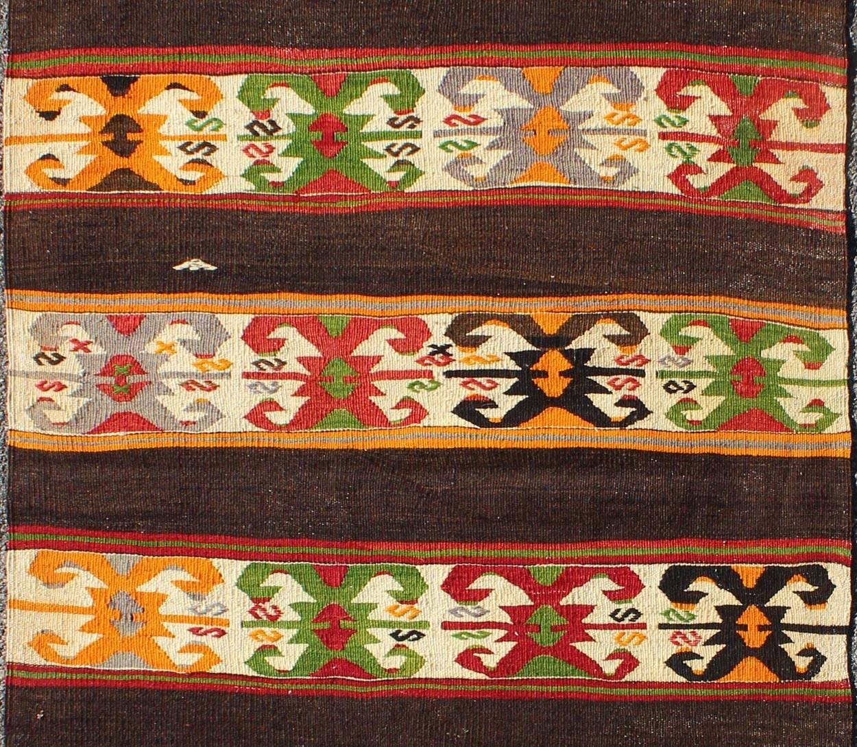 Turkish Brilliant Vintage Kilim Rug with Colorful Tribal Stripes on Charcoal Background For Sale