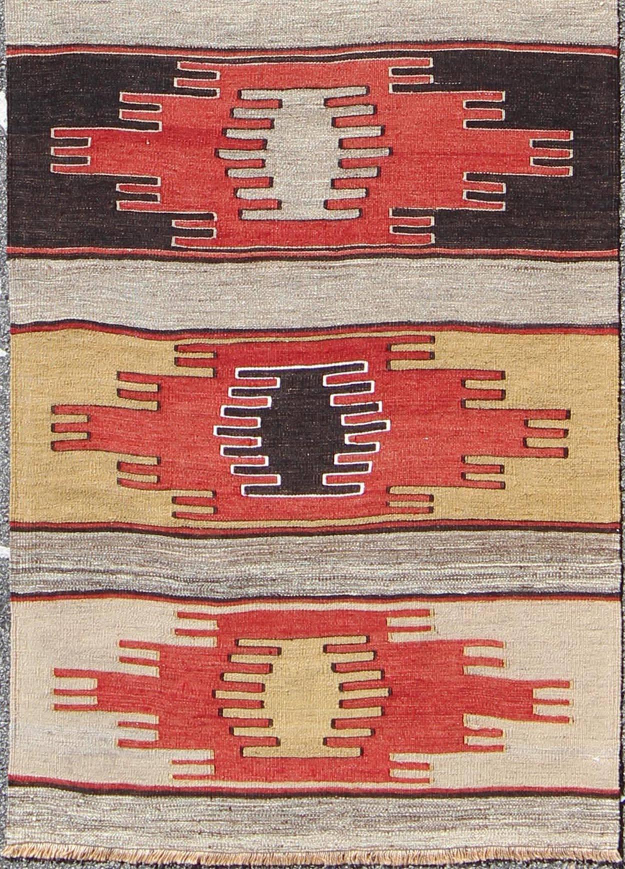 Vintage Turkish Kilim runner with large geometric medallions and stripe design, rug ned-138, country of origin / type: Turkey / Kilim, circa mid-20th century

Featuring large geometric medallions rendered in a repeating horizontal stripe design