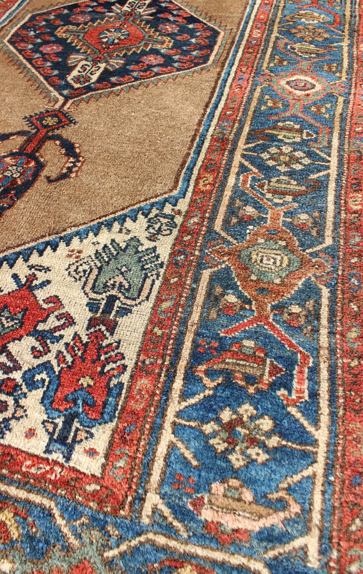 Hand-Knotted Antique Persian Serab Rug with Stretched Tribal Medallion in Camel, Blue & Ivory For Sale