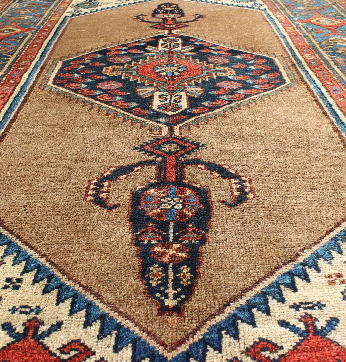 Antique Persian Serab Rug with Stretched Tribal Medallion in Camel, Blue & Ivory In Excellent Condition For Sale In Atlanta, GA