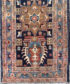 Antique Persian Heriz Runner with Geometric Medallions in Red, Blue, and Olive