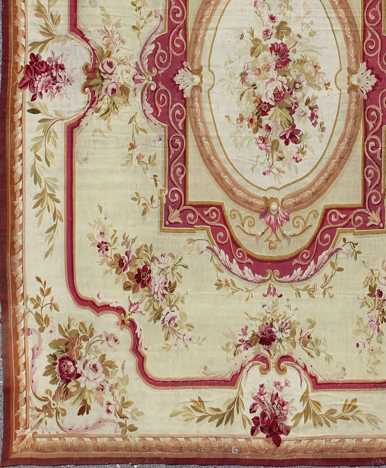 Antique Aubusson carpet with romantic rose bouquets in shades of red and pink, rug 16-1105, country of origin / type: Europe / Aubusson, circa 1870

This elegant antique Aubusson carpet is a resplendent example of the lush architectural style and