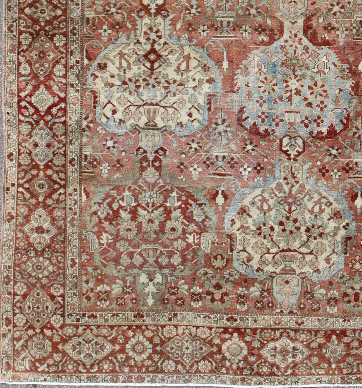 Antique Persian Bakhtiari rug with tiered sub-geometric medallions and motifs. Keivan Woven Arts /  rug 17-0101, country of origin / type: Iran / Bakhtiari, circa 1920

This stunning antique Persian Bakhtiari carpet features an incredible tiered