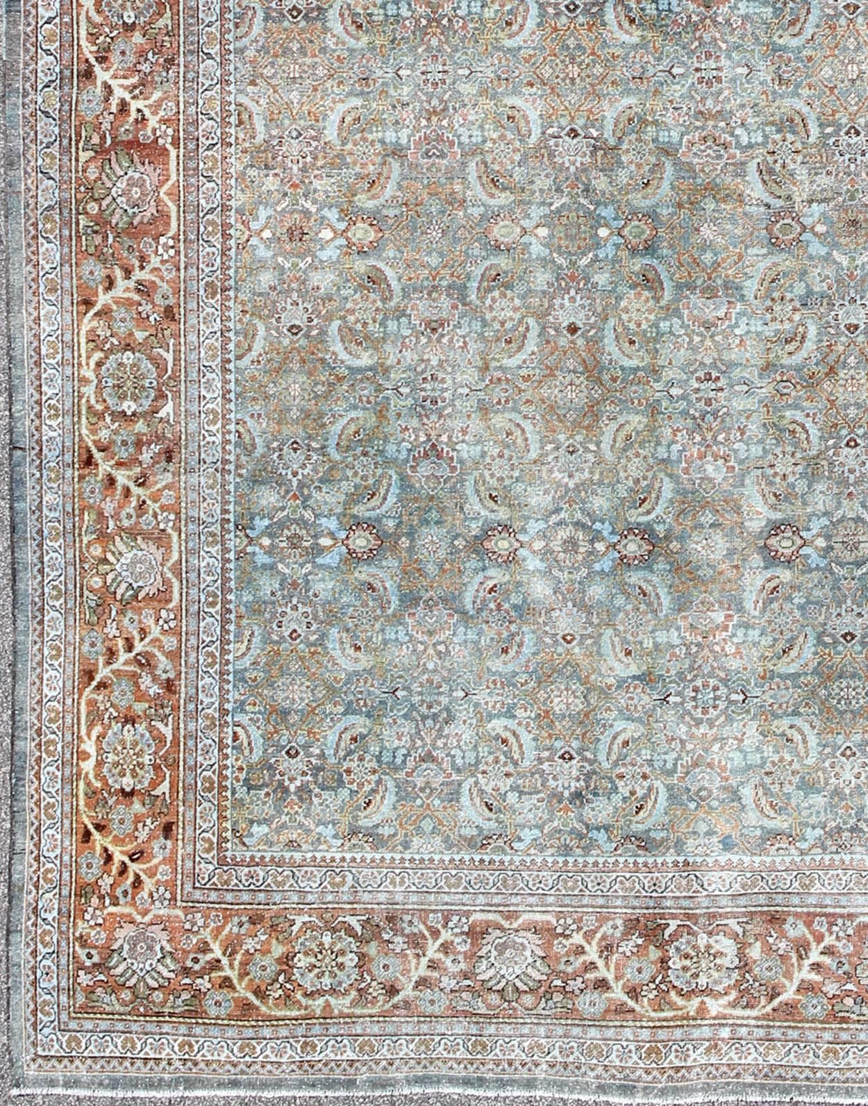 Antique Persian Sultanabad rug with all-over design in light blue and burnt orange, rug 17-0104, country of origin / type: Iran / Sultanabad, circa 1900

This beautiful and large antique Persian Sultanabad rug displays a gorgeous, all-over