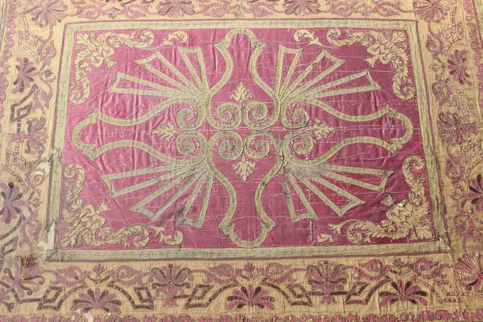 Framed antique European silk tapestry/bed spread with ornate design in purple red, rug 17-0604, country of origin / type: Europe / Tapestry, circa 1550.

This antique framed tapestry functioned as a royal silk bedspread almost 500 years ago, circa