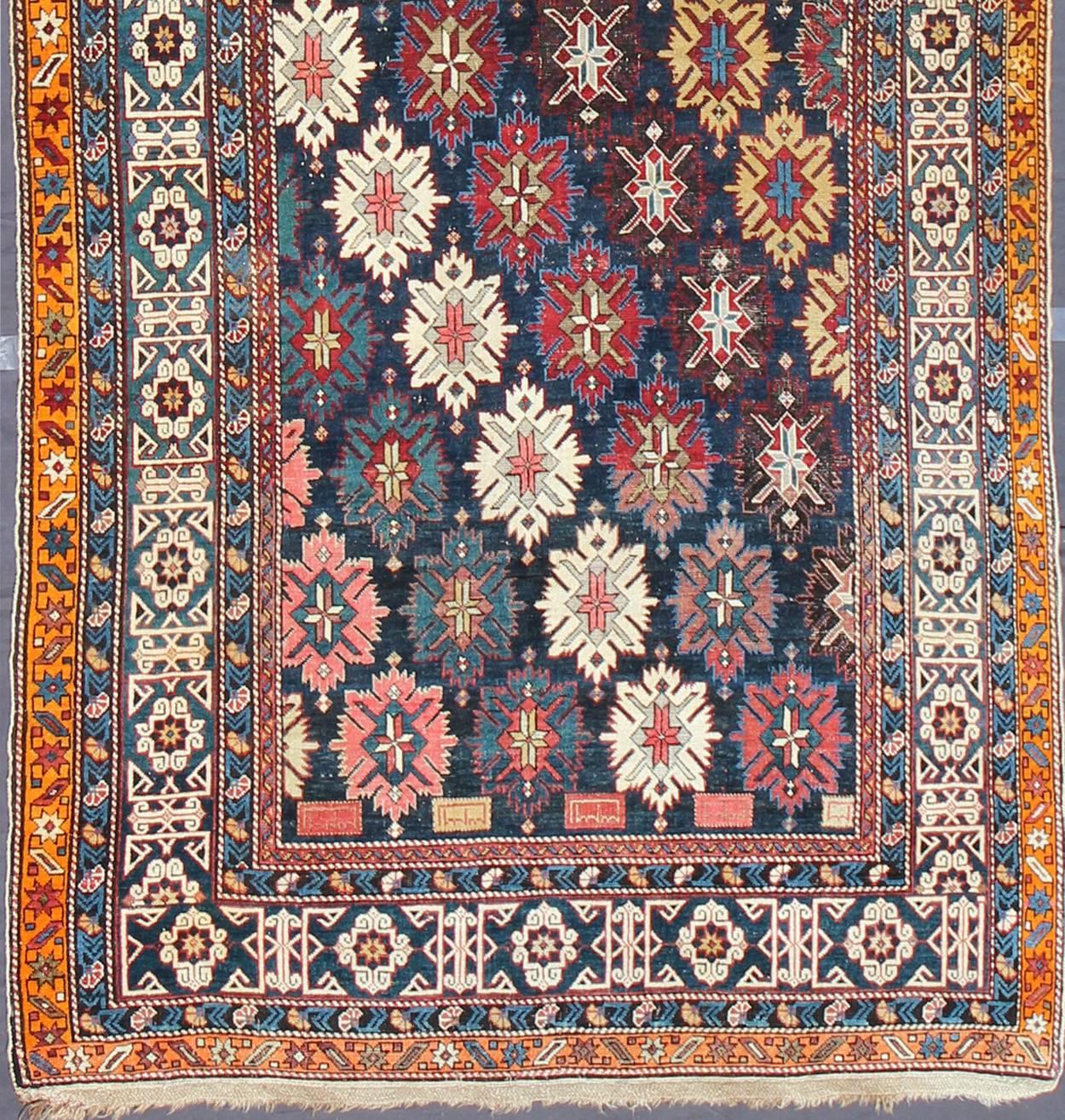 Colorful antique Kuba long and wide runner with multi-medallions and sub-geometric borders, rug 17-0804, country of origin / type: Caucasus / Kuba, circa 1880 gallery runner, large Caucasian

This colorful antique Kuba runner from the late 19th