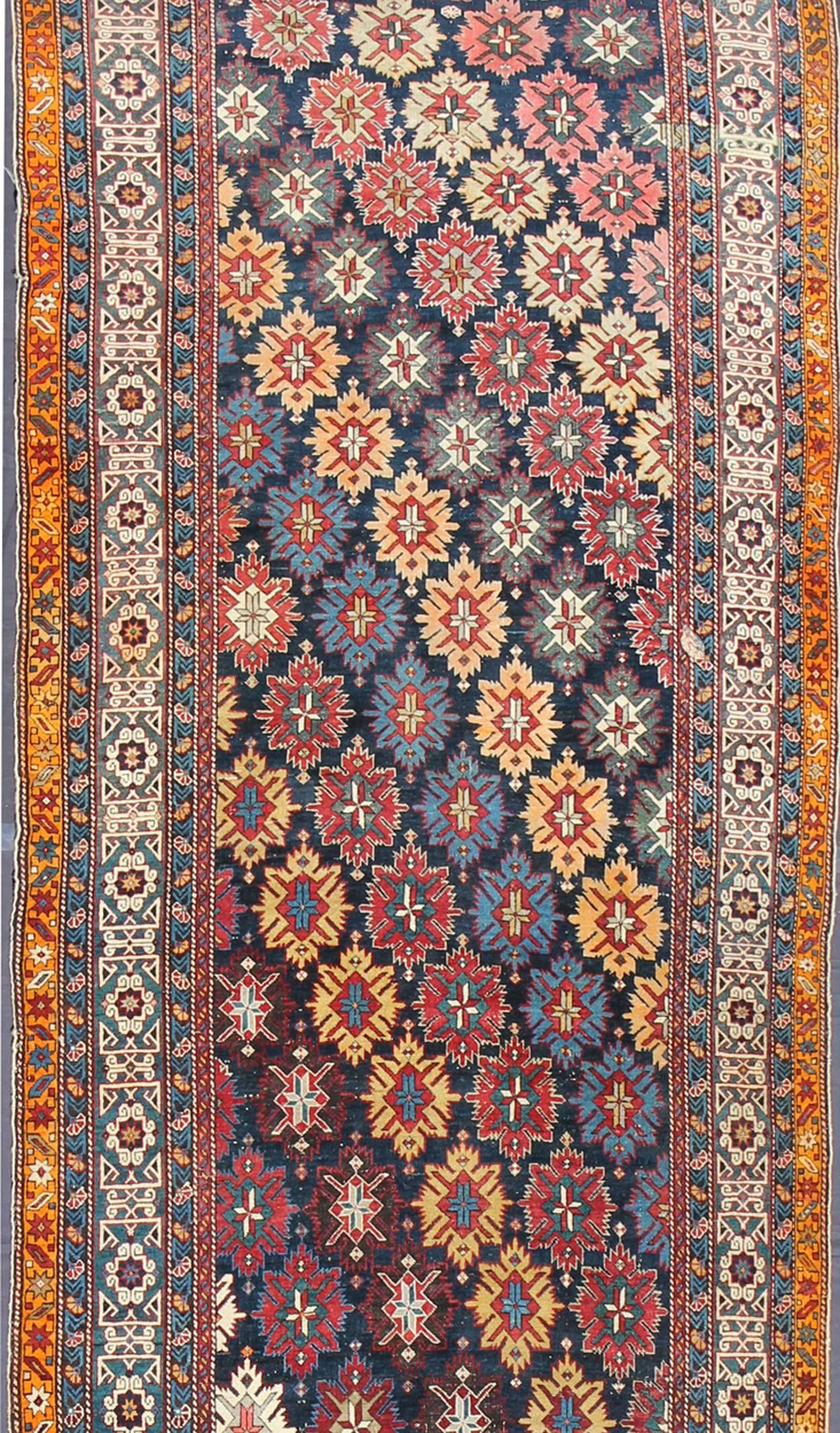 Caucasian Colorful Antique Kuba Large Gallery Runner with Multi-Geometric Medallions For Sale