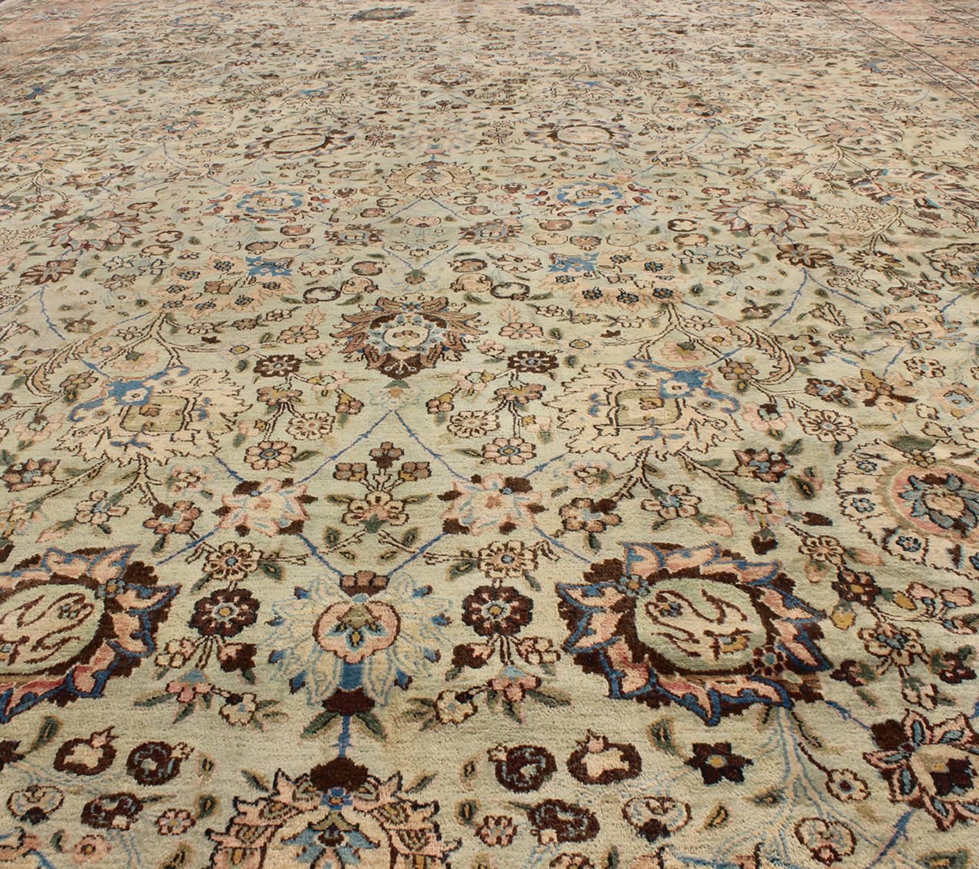 Mid-20th Century Vintage Persian Tabriz Rug, Intricate Floral Design in Light Green and Salmon