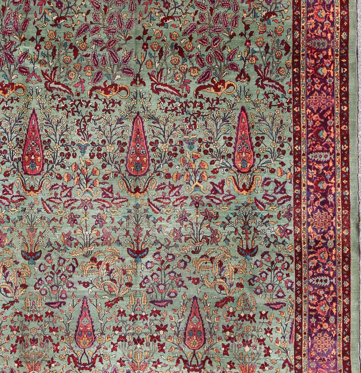 Indian Antique Agra Rug with Branching Floral Design in Mint Green, Purple and Burgundy For Sale