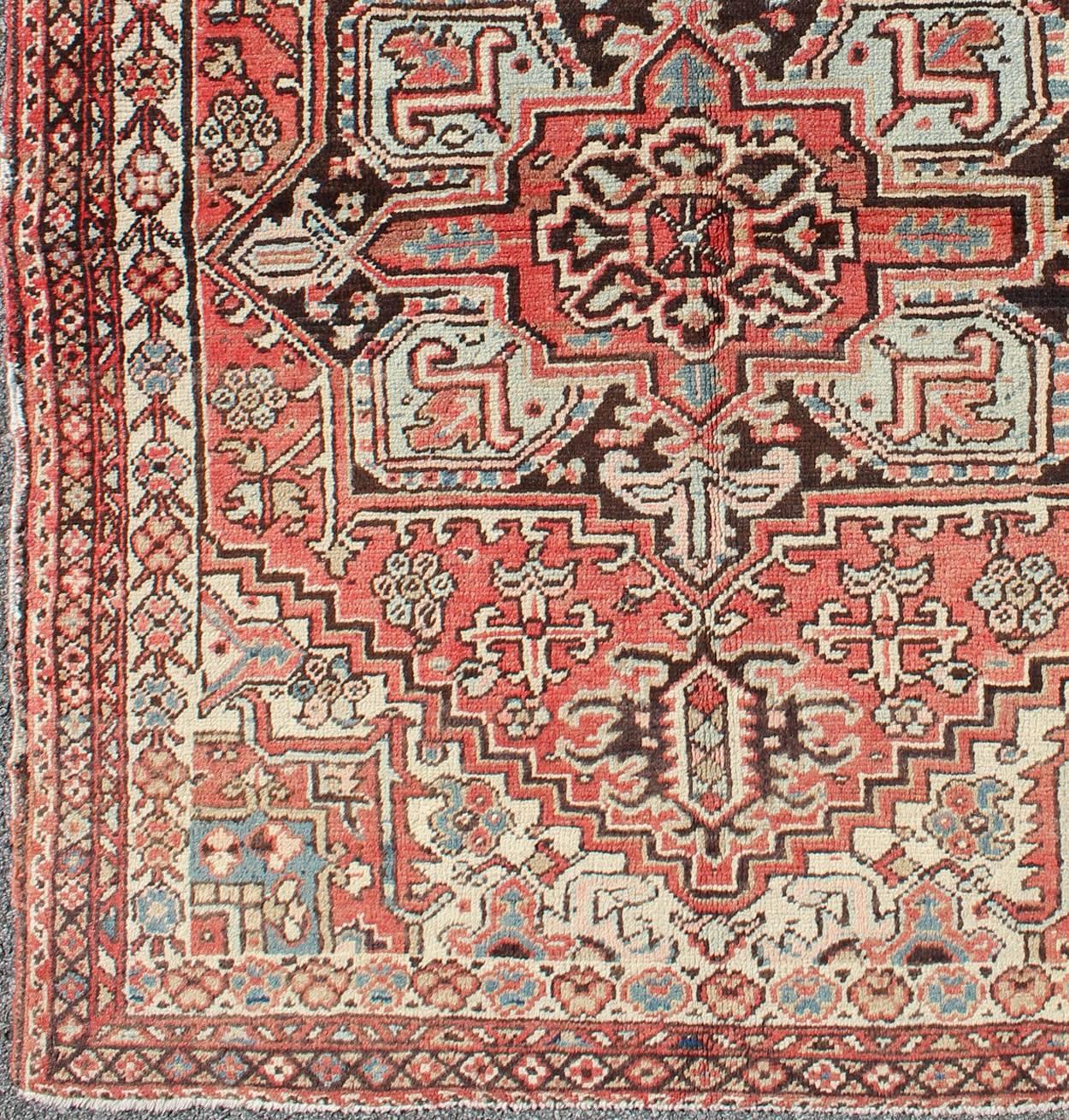Geometric stylized antique Persian Heriz rug with medallion, circa 1930's, rug dsp-ca16194, country of origin / type: Iran / Heriz Serapi, circa 1930.

This Squarish Size antique Persian Heriz carpet from the second quarter of 20th century (circa