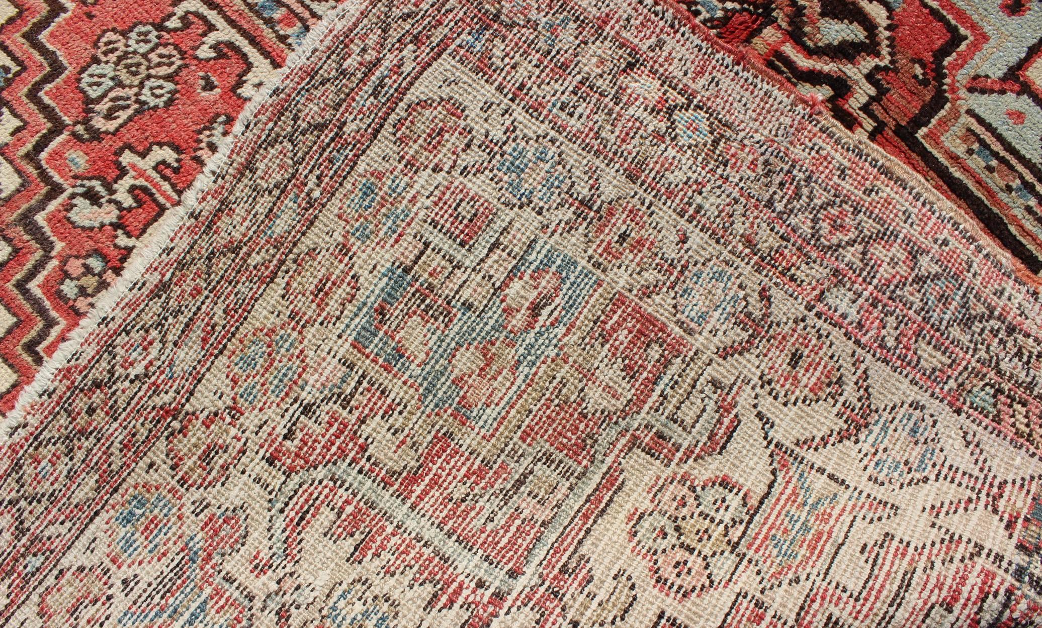 Wool Square Size Antique Persian Small Heriz Rug with Medallion in Soft Colors For Sale