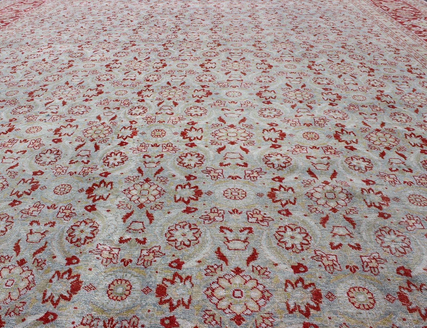 Wool All-Over Floral Design Antique Persian Tabriz Rug in Shades of Gray-Blue and Red For Sale